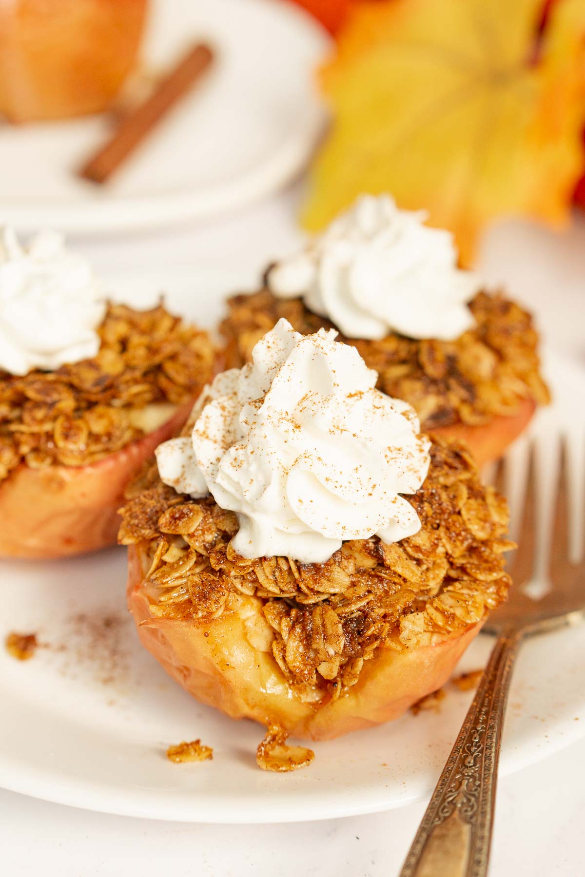 Air fryer baked apples with whipped cream on top