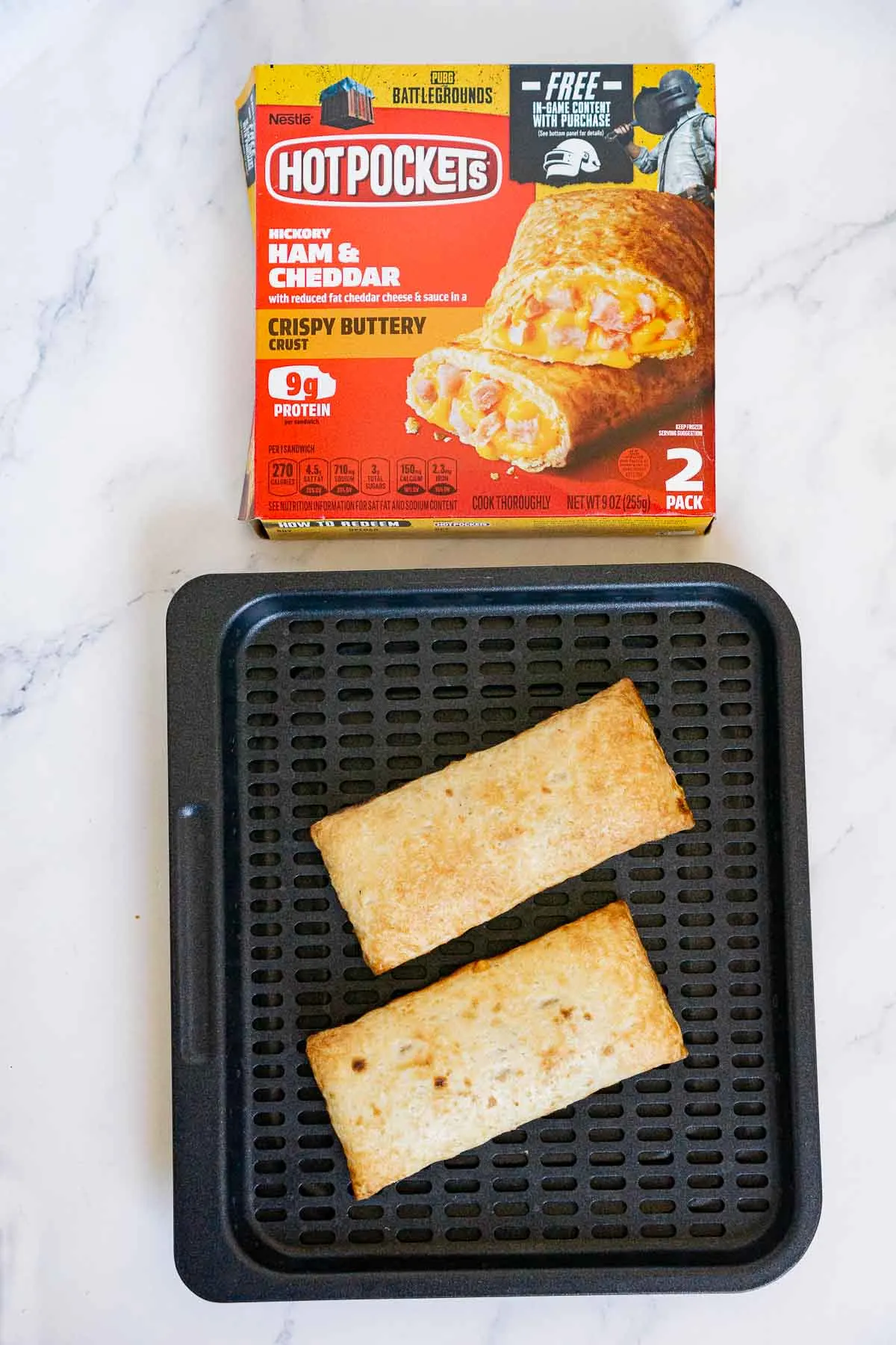 2 Hot pockets on an air fryer tray
