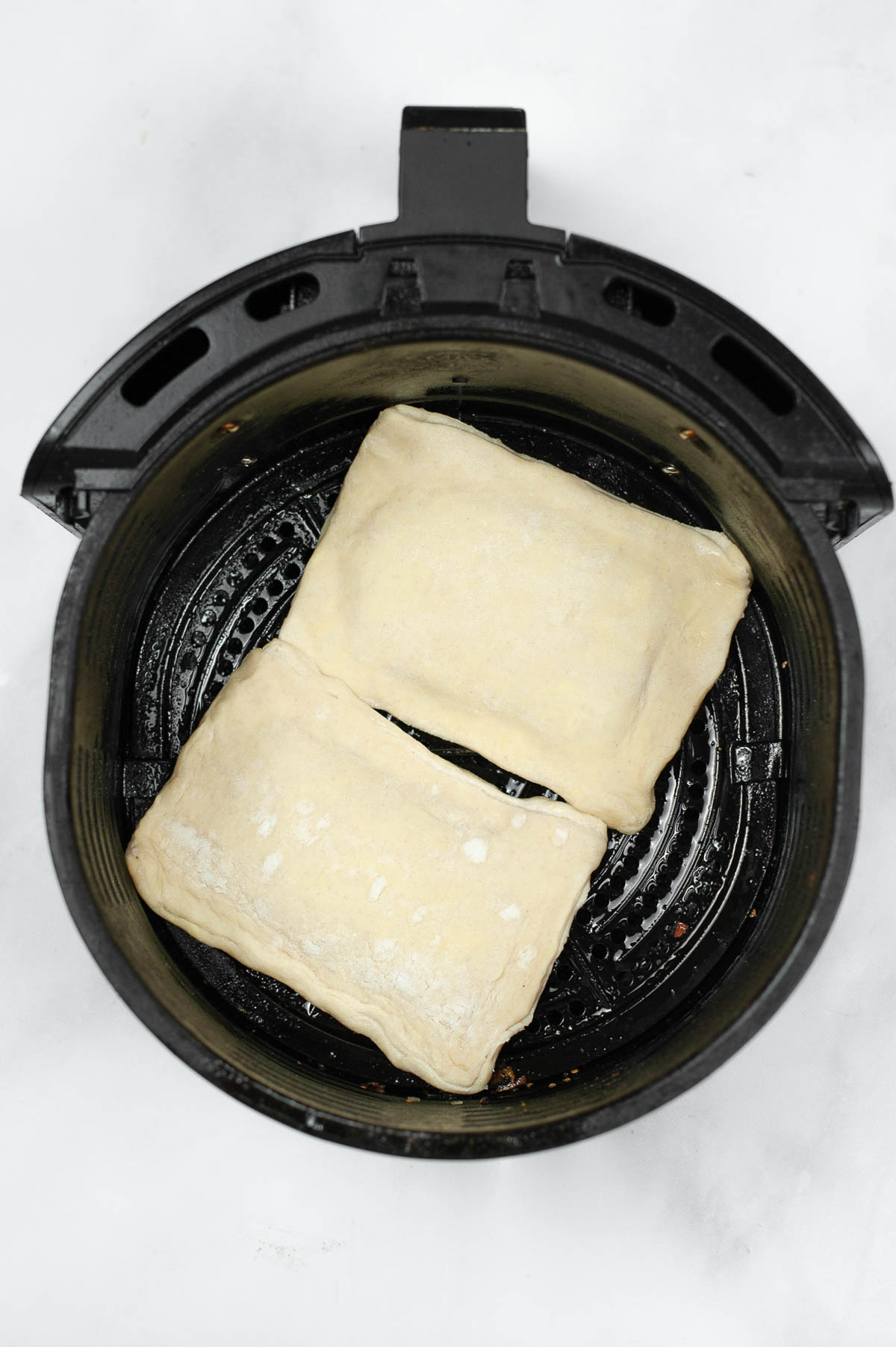 2 puff pastry toaster strudels in an air fryer