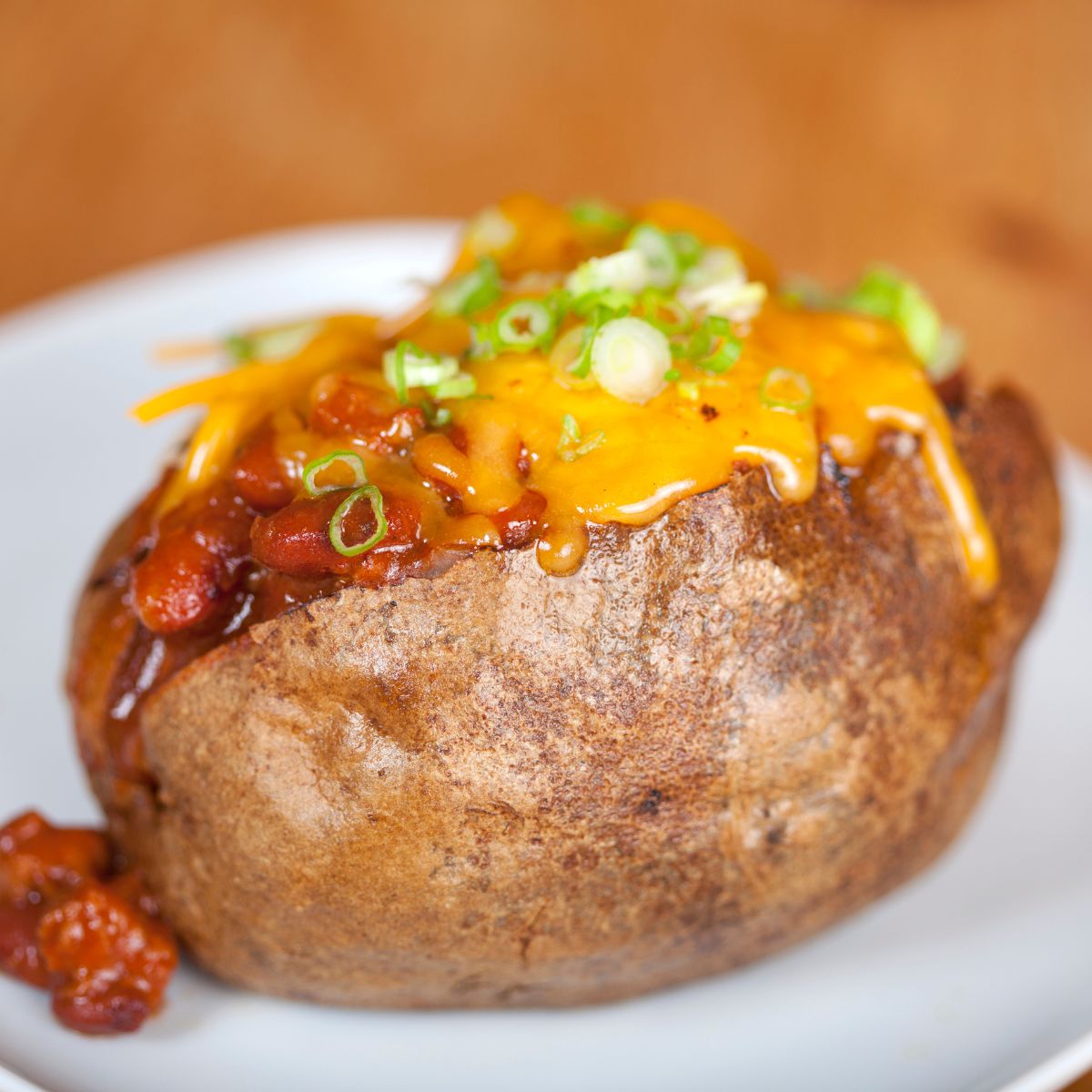 Baked potato with chili and cheese