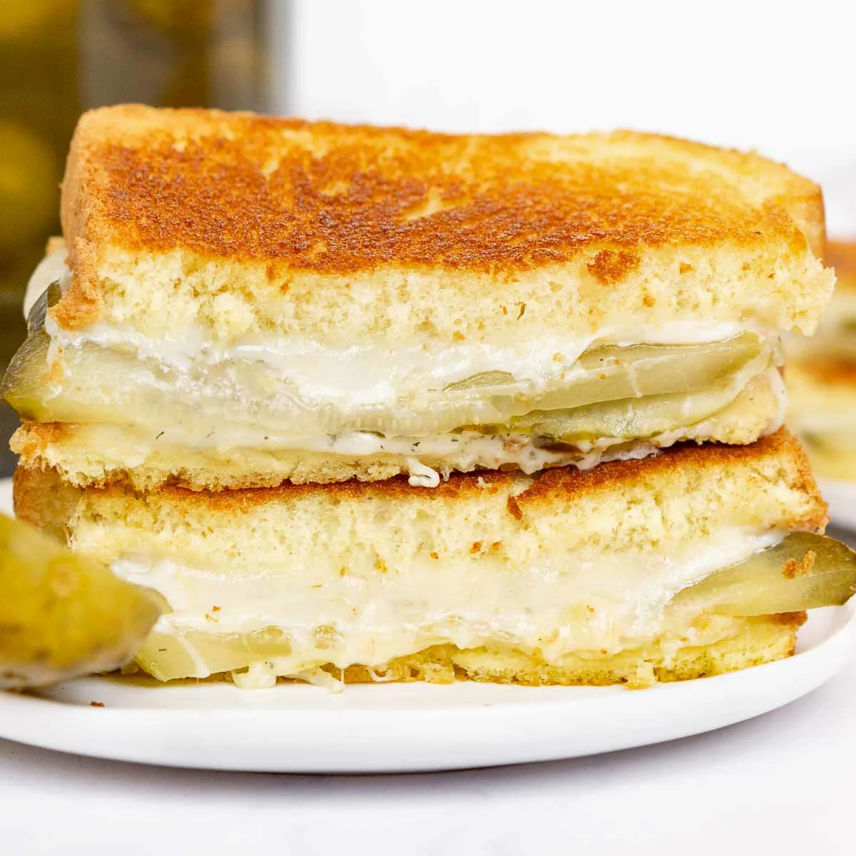 Pickle grilled cheese sandwich on a plate