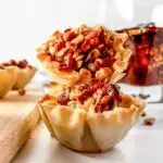 2 pecan pie cups stacked on top of each other