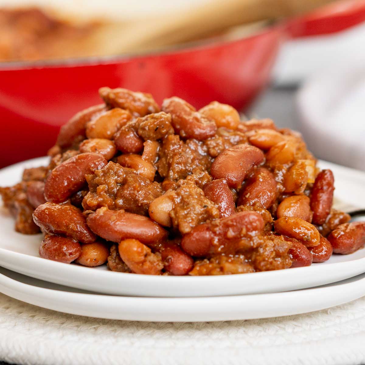 Close up of ground beef baked beans on a plate