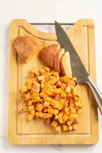 Diced sweet potato on a cutting board