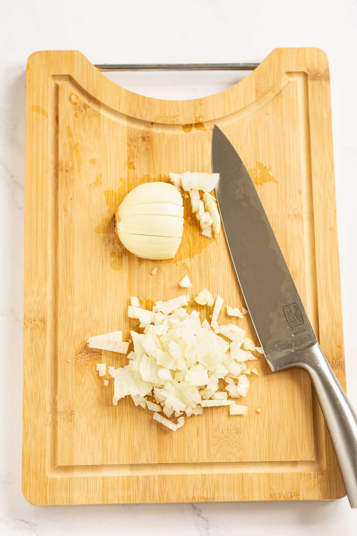 Finely diced onion on a cutting board