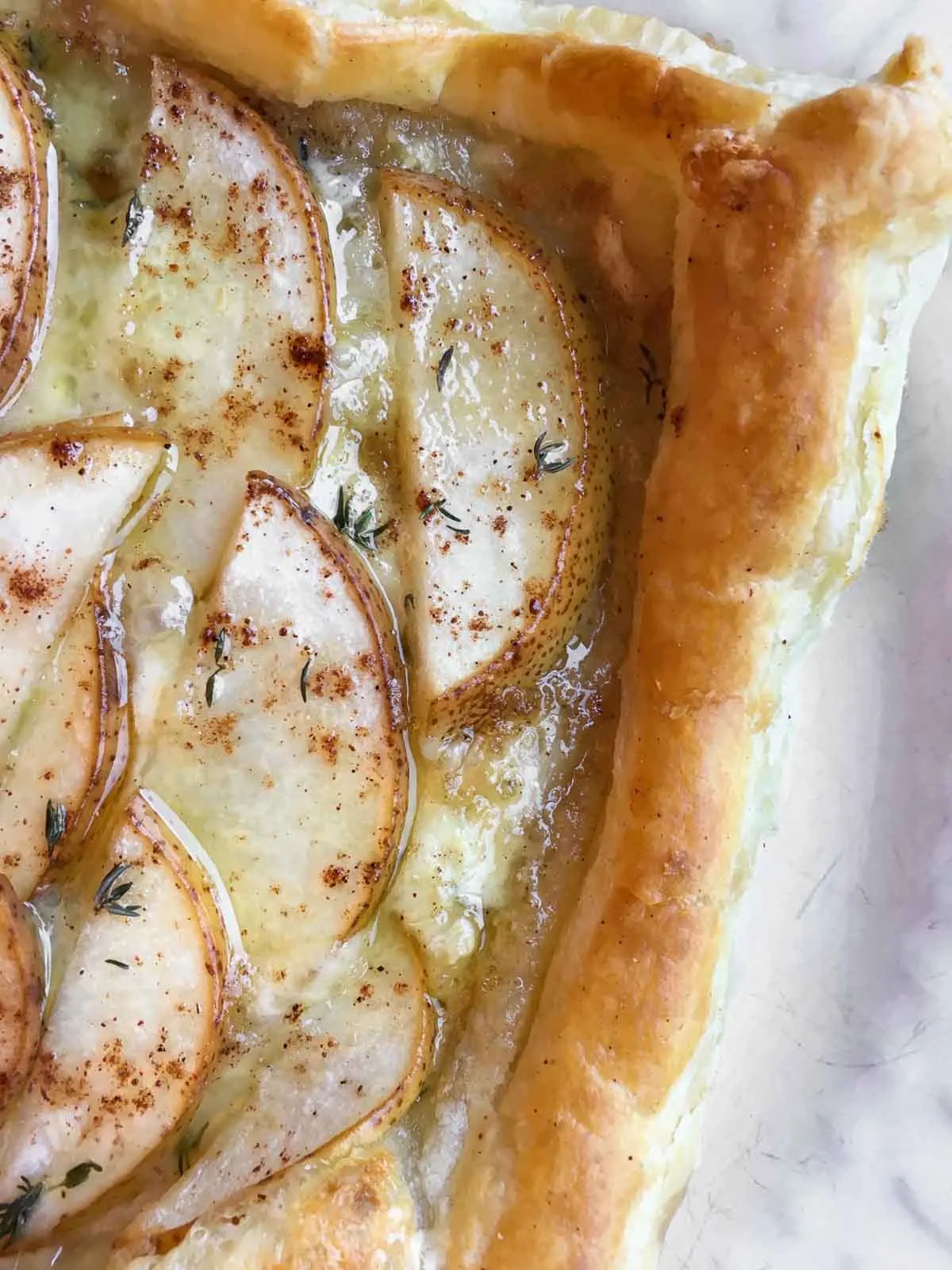Sliced pears on puff pastry appetizer