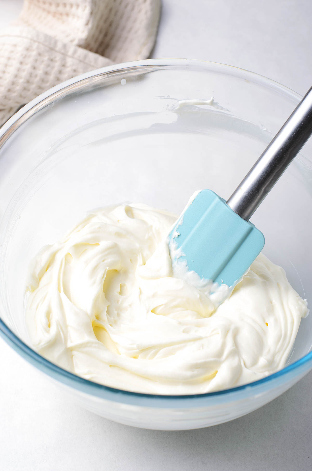 Folding whipped cream and cream cheese mixture