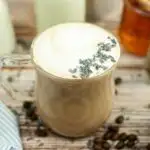 Honey lavender latte garnished with lavender flowers