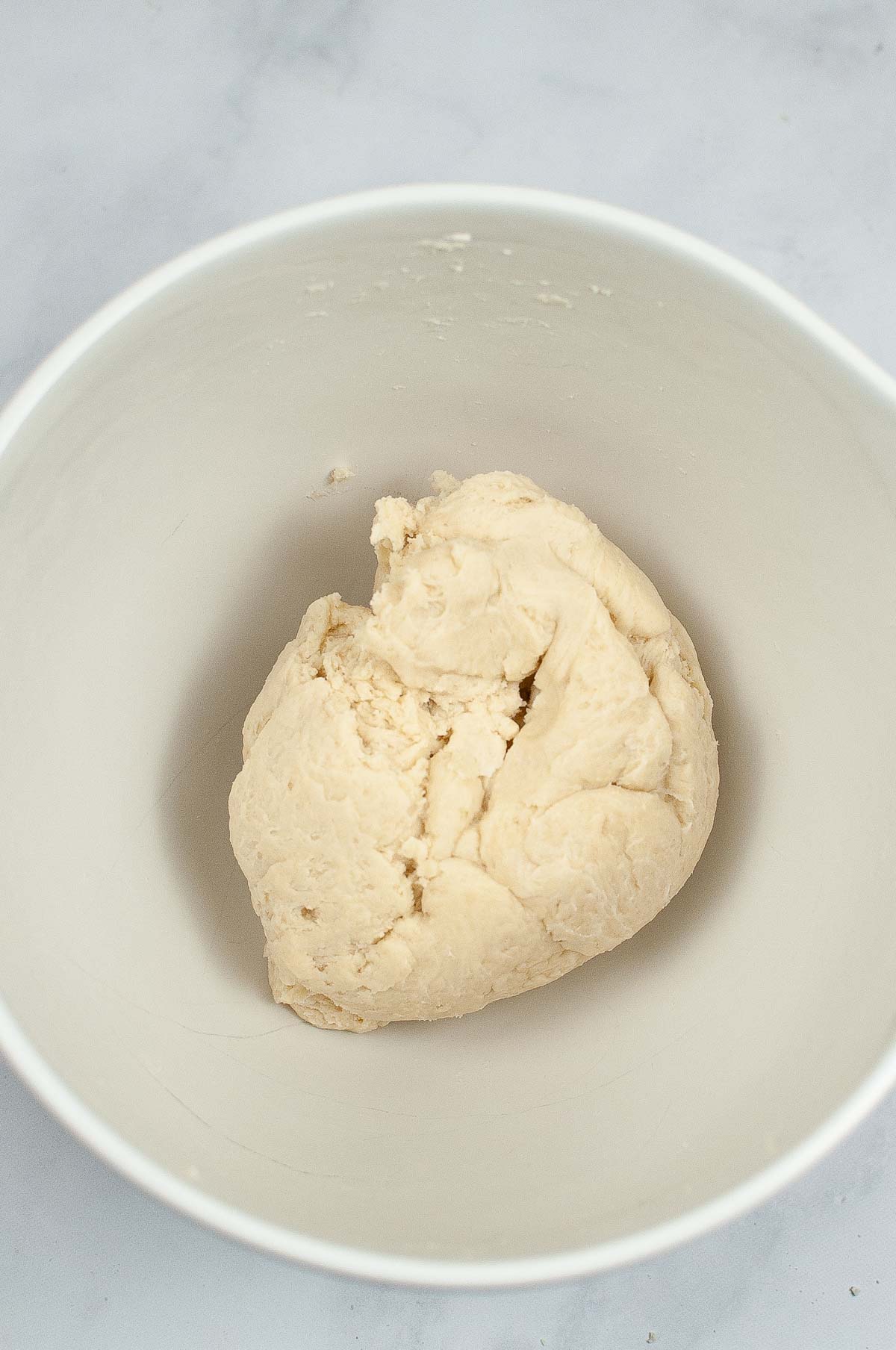 Pie crust dough in a bowl