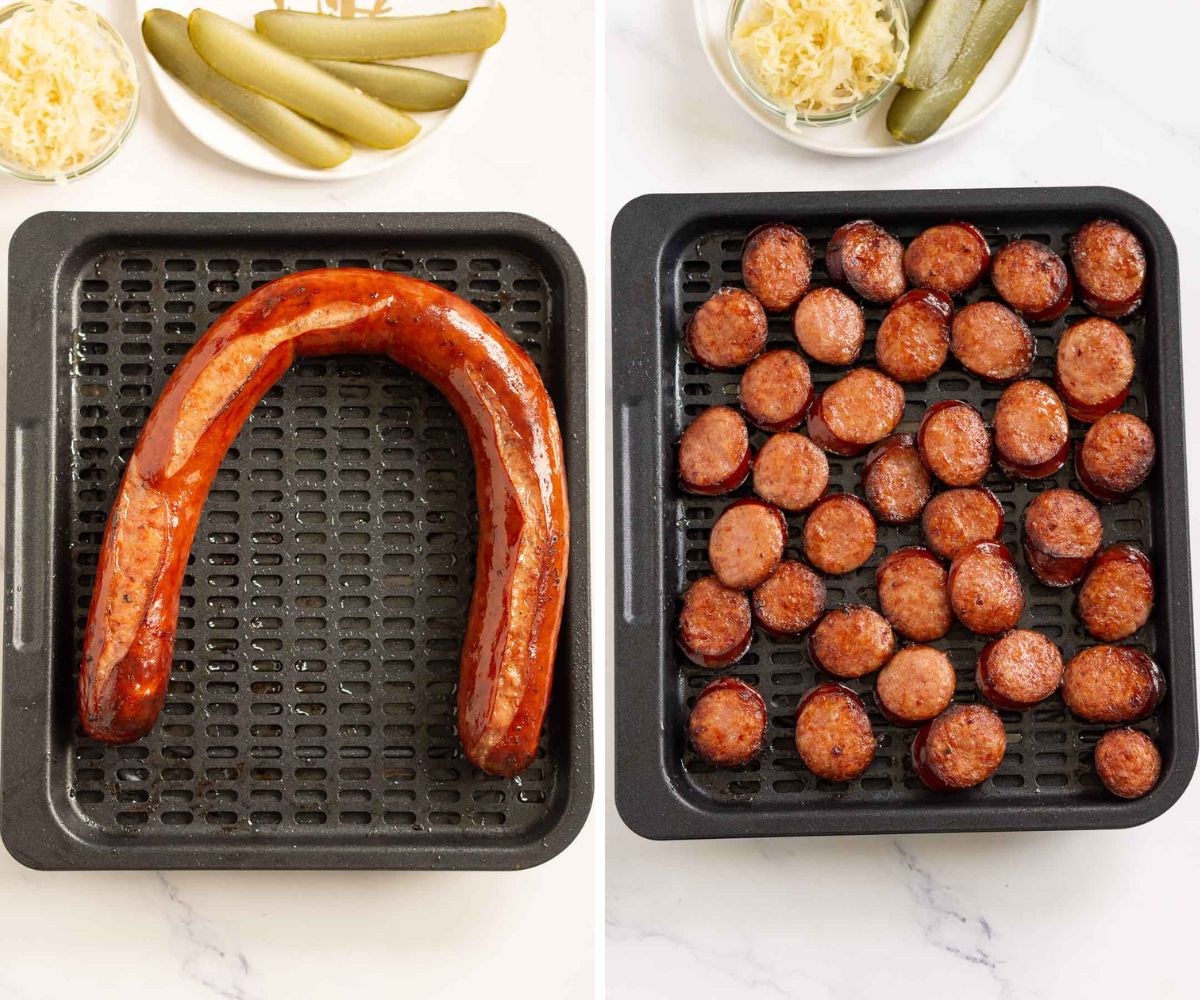 Cooked whole and sliced kielbasa on an air fryer tray