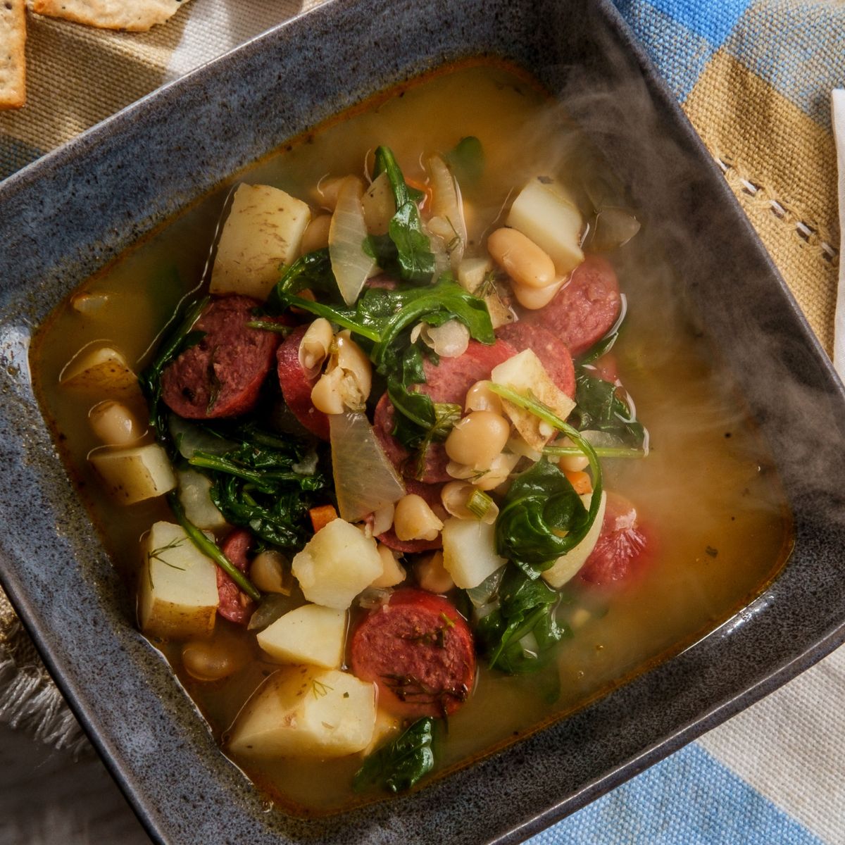 Kielbasa soup with potatoes and greens.