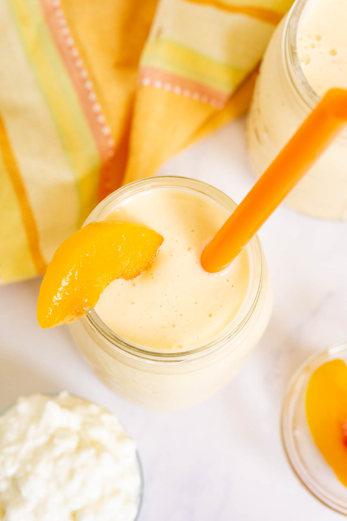 Cottage cheese smoothie garnished with peach