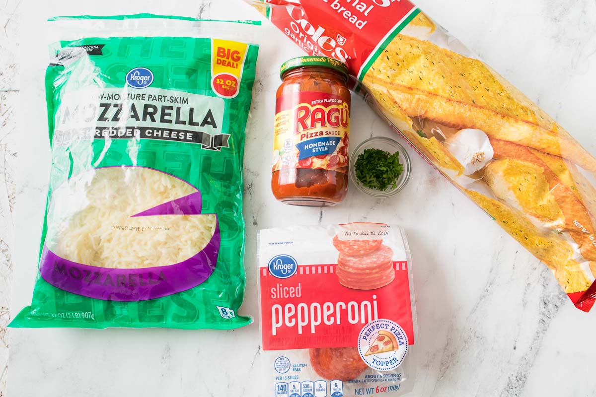 Ingredients to make pepperoni garlic bread pizza