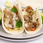 2 Philly Cheesesteak Tacos on a plate