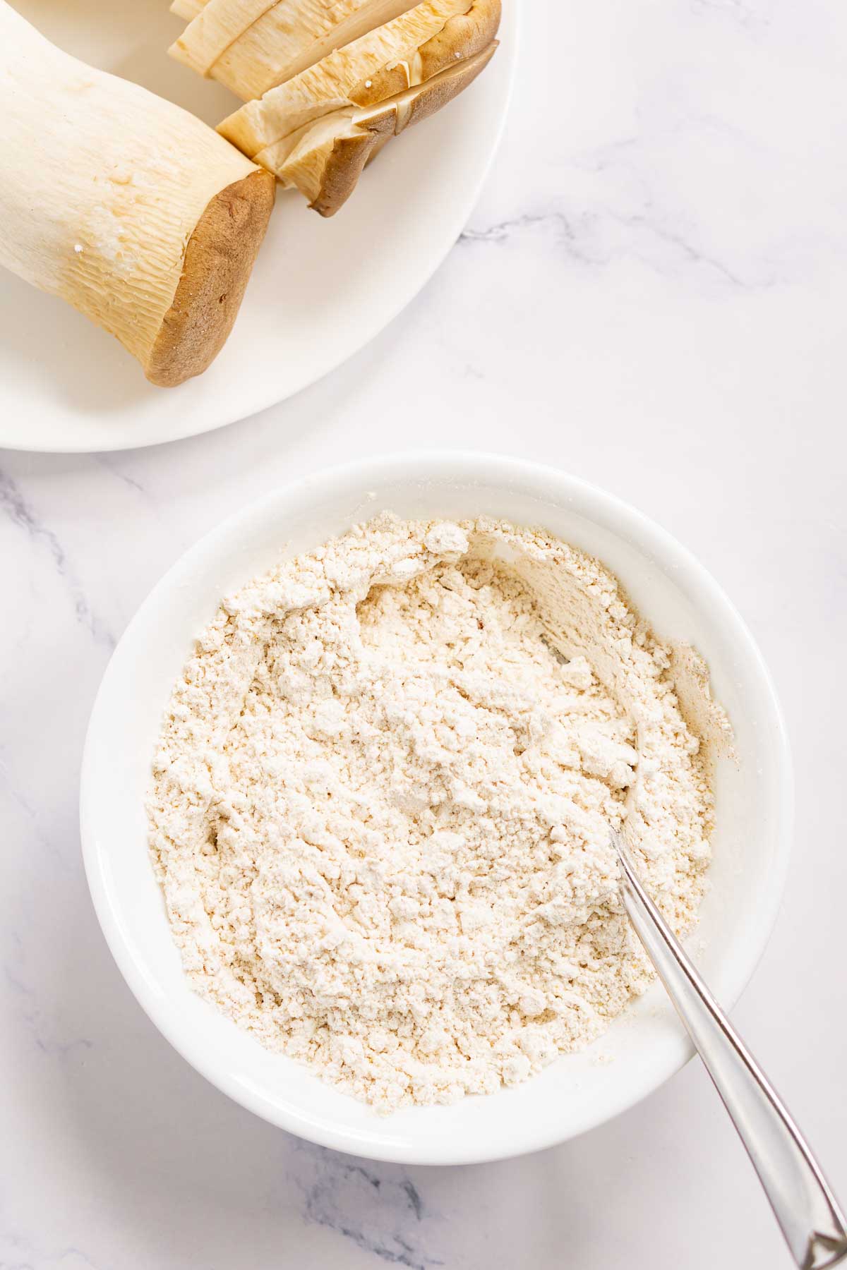 Seasoned flour mixture in a bowl