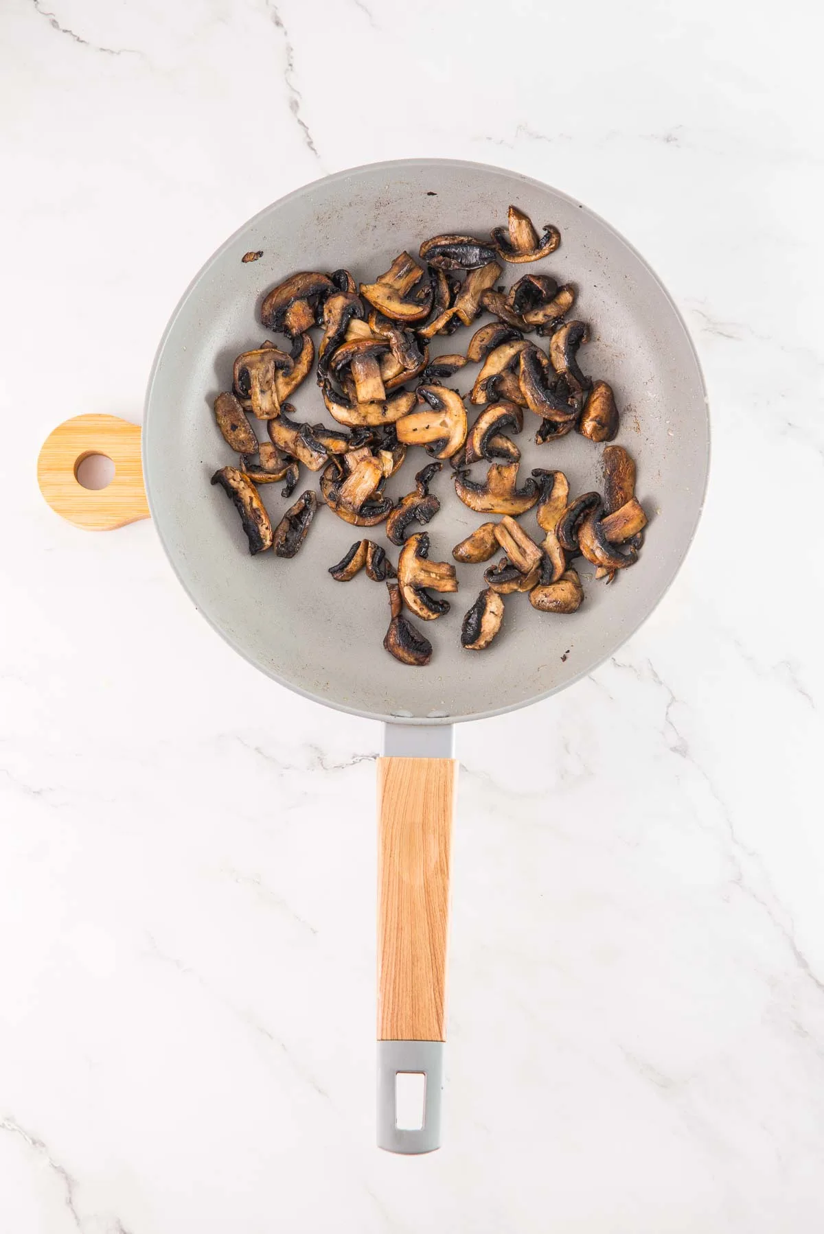 Sauteed mushrooms in a pan