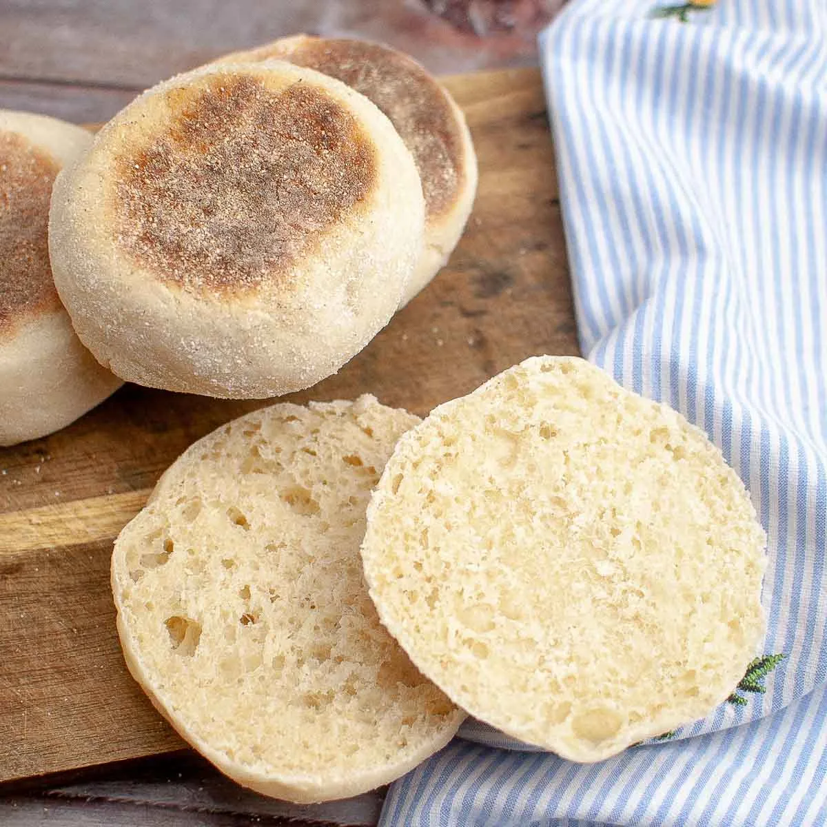 Sourdough discard English muffins cut in half to show texture