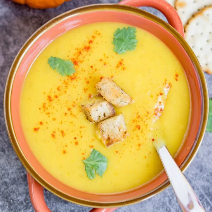 Bowl of creamy Pumpkin Potato Soup with Sourdough Croutons