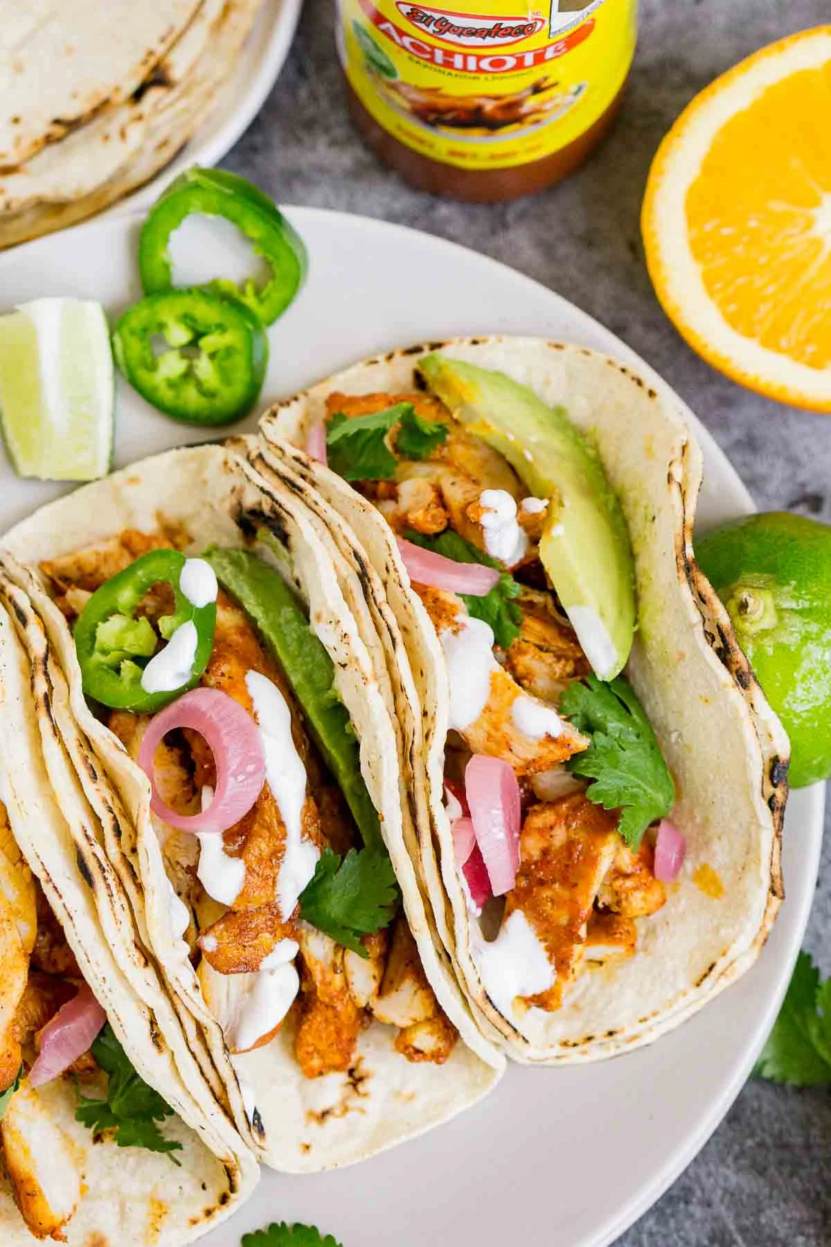 2 Achiote chicken tacos on a plate
