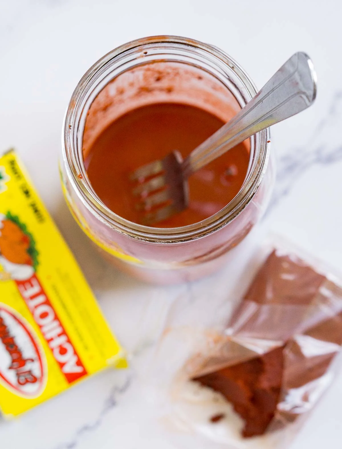 Jar of achiote sauce made from achiote paste