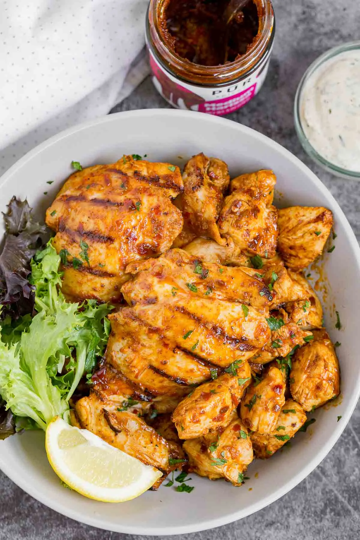 Grilled harissa chicken in a bowl