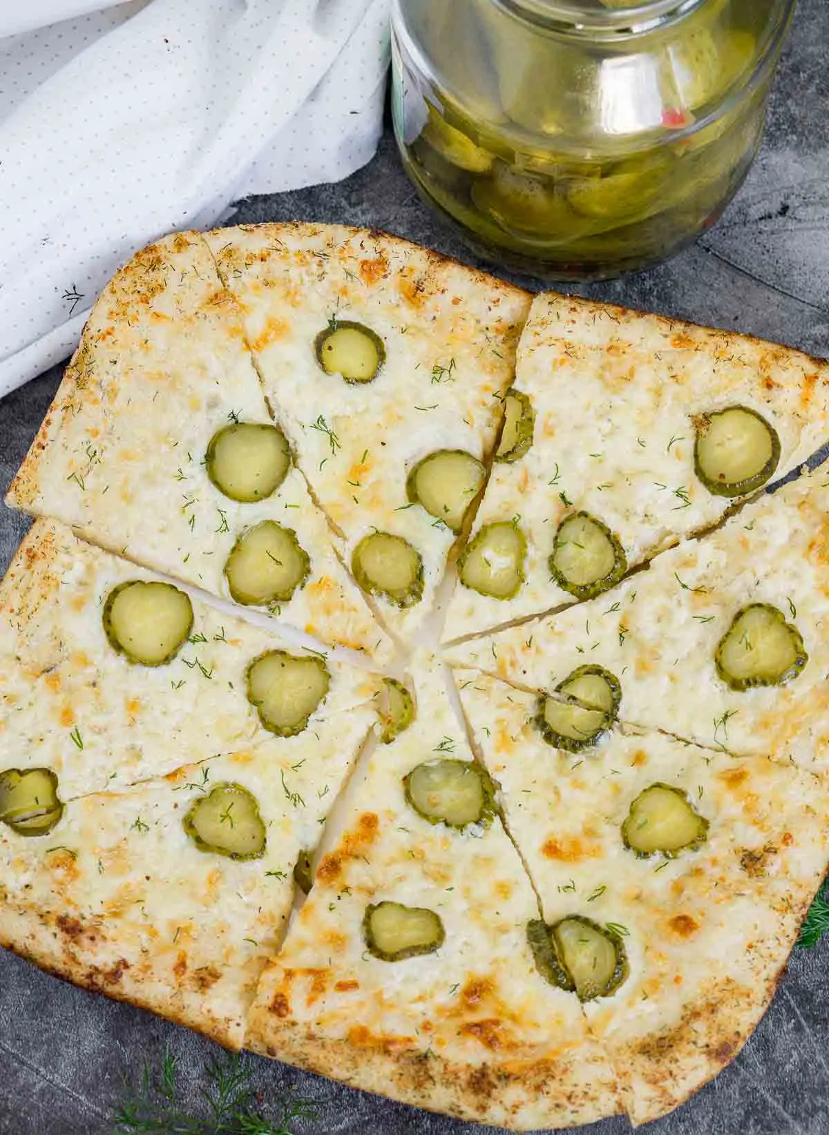Dill pickle pizza on a plate