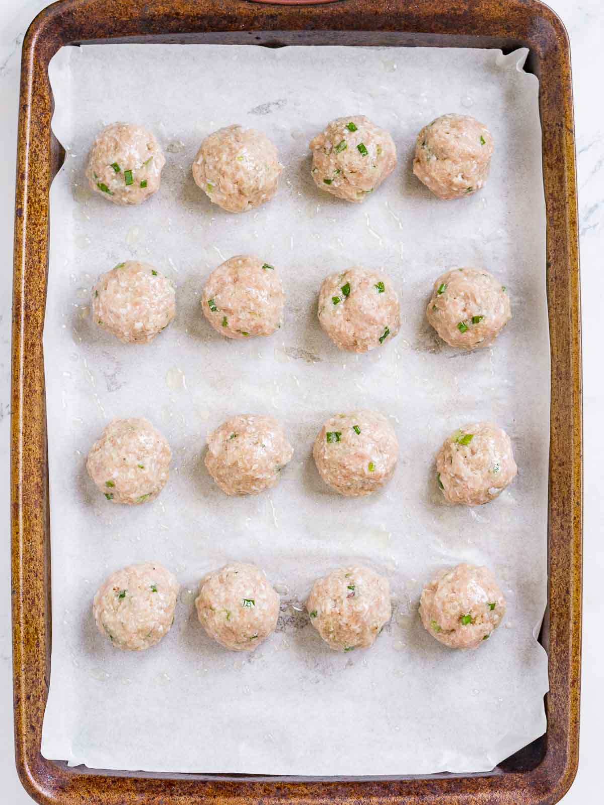Baking sheet with turkey meatballs