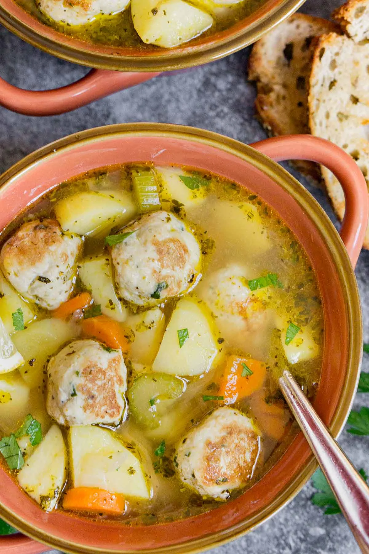 Close up of a bowl of chicken meatball soup