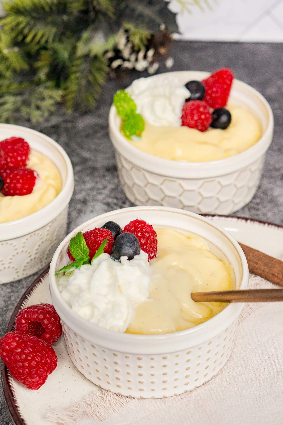 3 ramekins with eggnog custard