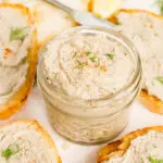 Sardine P&acirc;t&eacute; on an appetizer board with toasted baguettes
